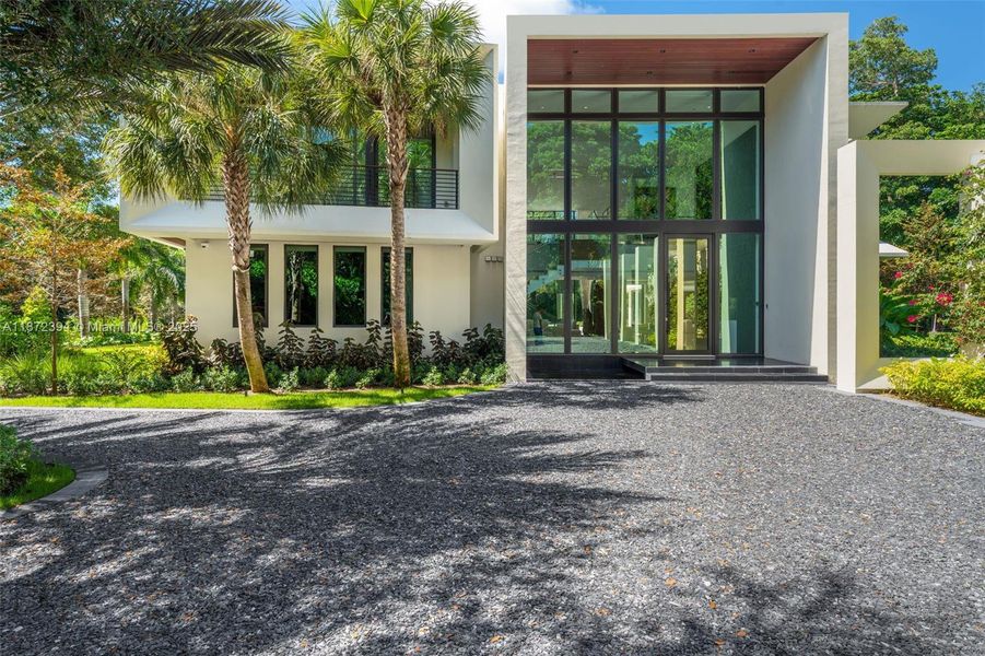 Front exterior of a new home in , Coral Gables, FL, highlighting curb appeal (Image 1).