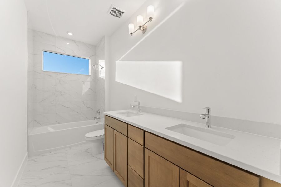 Representative furnished interior of a home built from the Cape by Mattamy Homes in Newfield - Rosette Park, Palm City (Image 8).