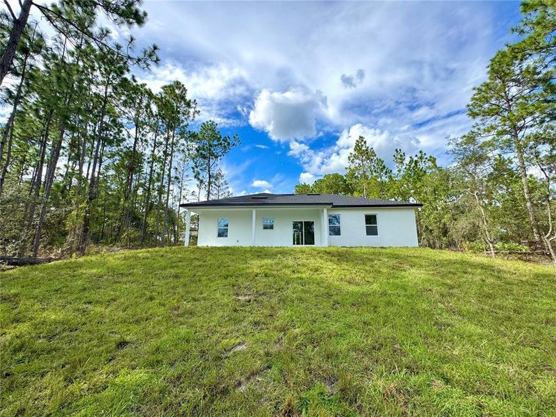 Front exterior of a new home in , Citrus Springs, FL, highlighting curb appeal (Image 17).