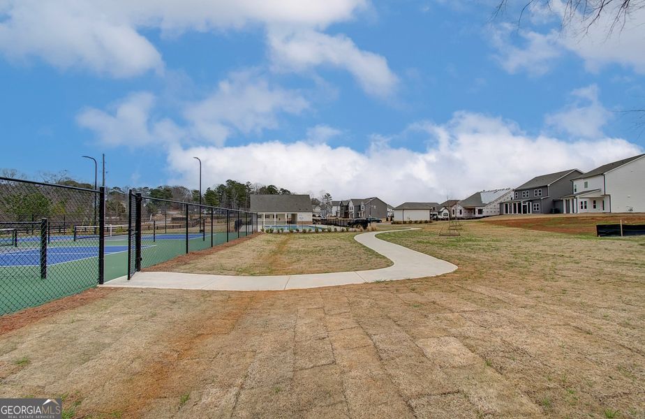 Front exterior of a new home in Ponderosa Farms Manor, Gainesville, GA, highlighting curb appeal (Image 29).