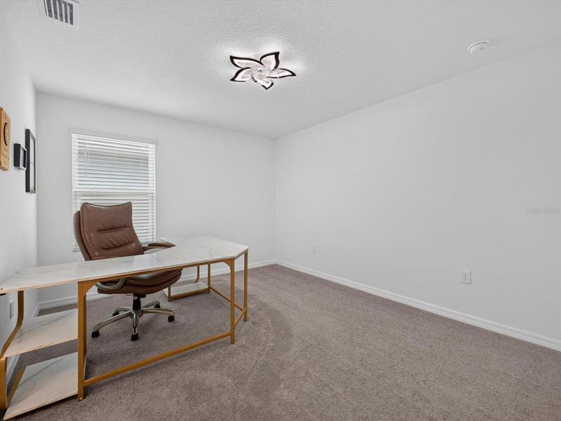 Furnished interior view inside a new home in Storey Creek, Kissimmee (Image 46).