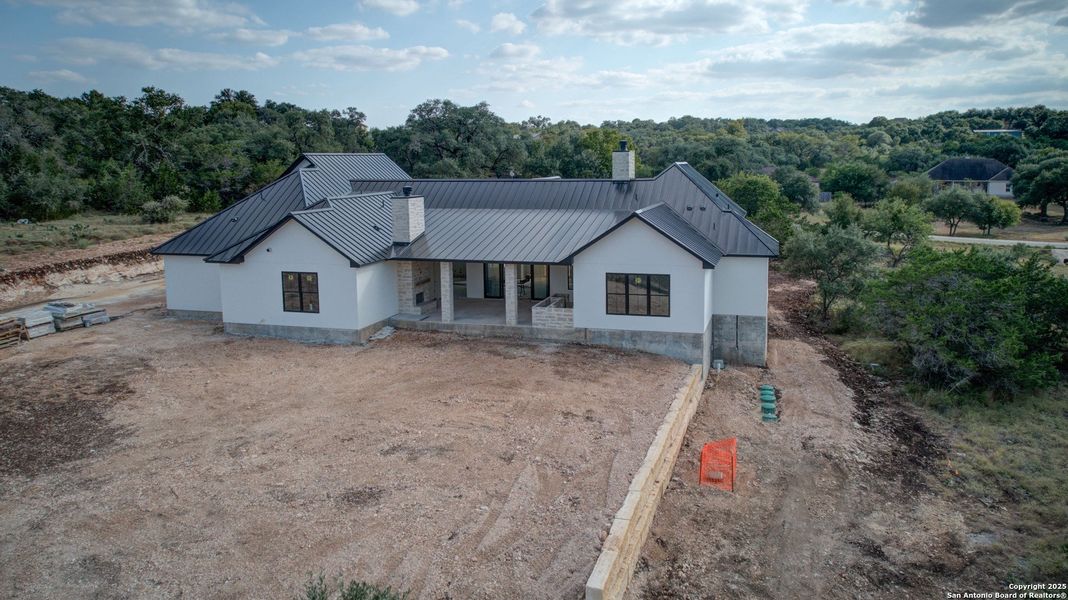 Front exterior of a new home in , New Braunfels, TX, highlighting curb appeal (Image 23). Front exterior of a new home in , New Braunfels, TX, highlighting curb appeal (Image 23).