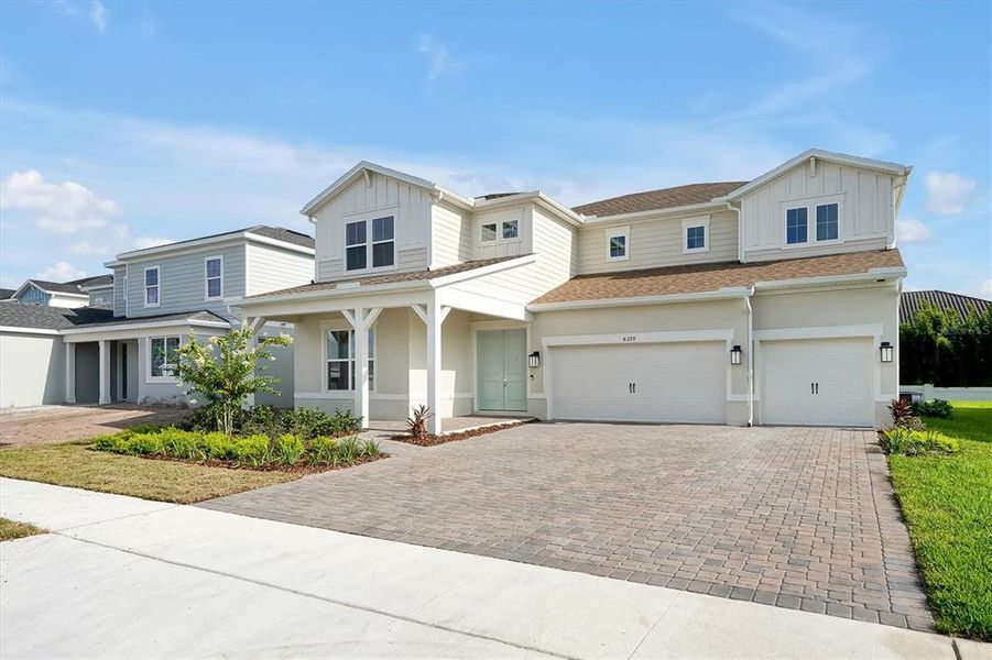 Front exterior of a new home in , Orlando, FL, highlighting curb appeal (Image 2). Front exterior of a new home in , Orlando, FL, highlighting curb appeal (Image 2).