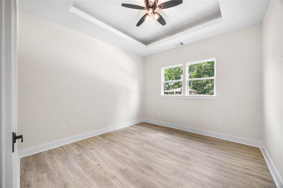 Great Size 4th Bedroom with Walk-In Closet and Trey Ceiling, Perfect Room for Guests or Mother-In-Law Suite.