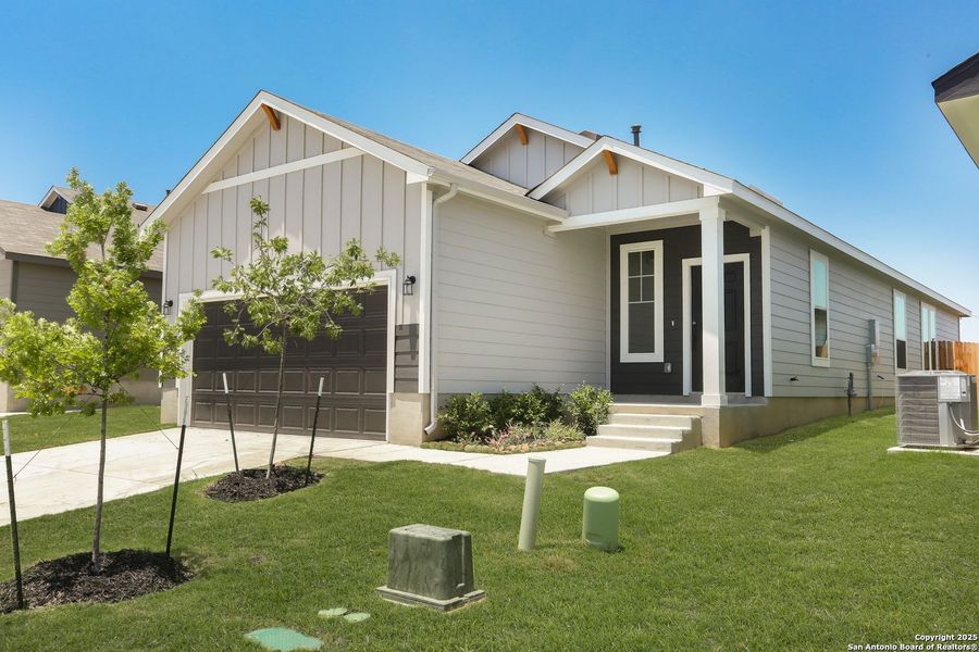 Front exterior of a new home in Fairway Crossing 40s, San Antonio, TX, highlighting curb appeal (Image 22).