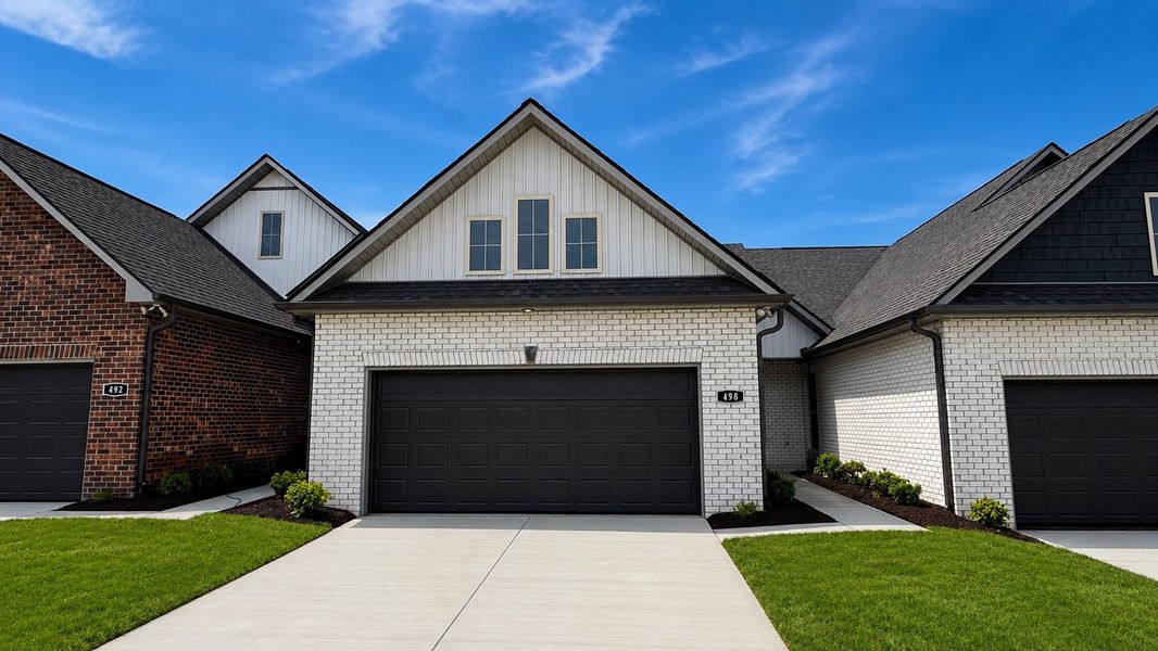 Front exterior of a new home in The Greens at Legacy Townhomes, Springfield, TN, highlighting curb appeal (Image 2). Front exterior of a new home in The Greens at Legacy Townhomes, Springfield, TN, highlighting curb appeal (Image 2).