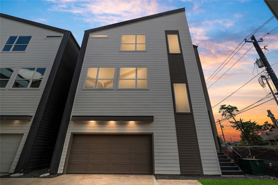 Striking angles meet soft sky—this Delafield façade blends modern minimalism with everyday curb appeal.