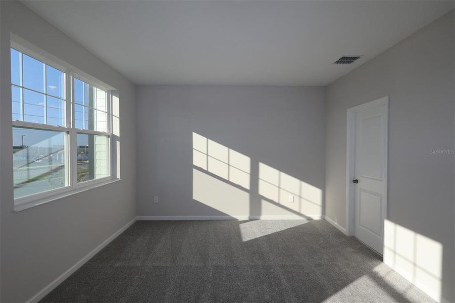 Spacious, unfurnished interior of a new home in Tribute at Ovation, Winter Garden (Image 41). Spacious, unfurnished interior of a new home in Tribute at Ovation, Winter Garden (Image 41).