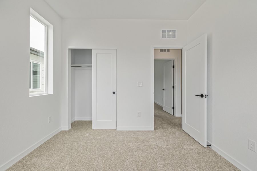 Spacious, unfurnished interior of a new home in Painted Prairie, Aurora (Image 34).
