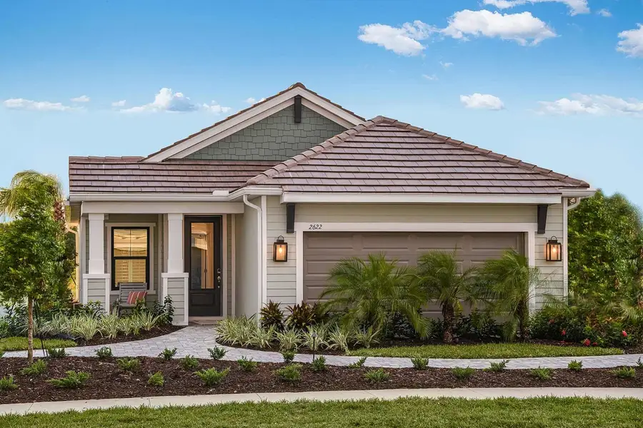 Representative exterior photo of a completed home built from the Dream 2 by Neal Communities in Windward, Sarasota, FL (Image 1). Representative exterior photo of a completed home built from the Dream 2 by Neal Communities in Windward, Sarasota, FL (Image 1).