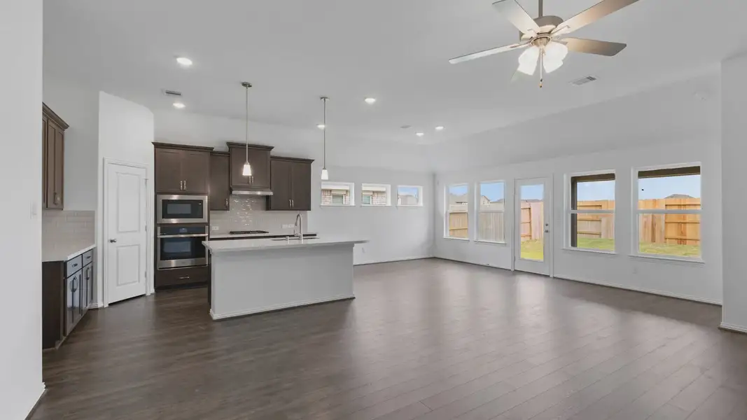 Furnished interior view inside a new home in Sunterra, Katy (Image 10).