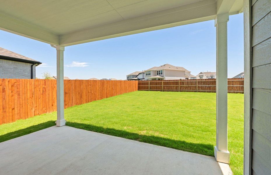 Exterior details and patio area of a home in Santa Rita Ranch, Liberty Hill (Image 23).