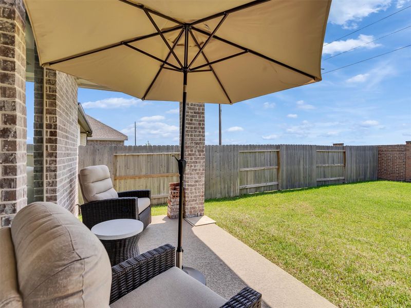 Exterior details and patio area of a home in Marvida, Cypress (Image 3).