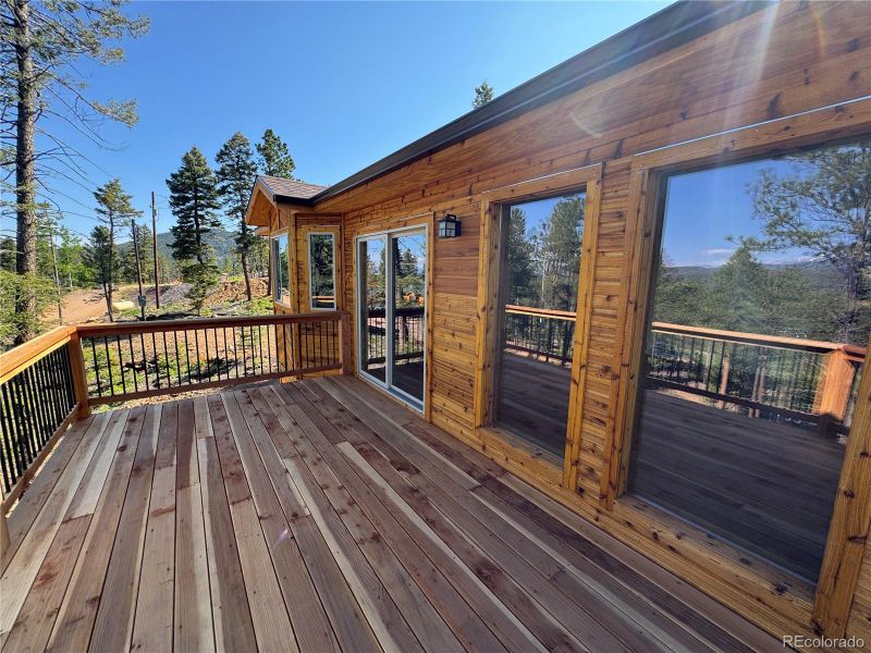 Spacious deck with views of Mt. Blue Sky