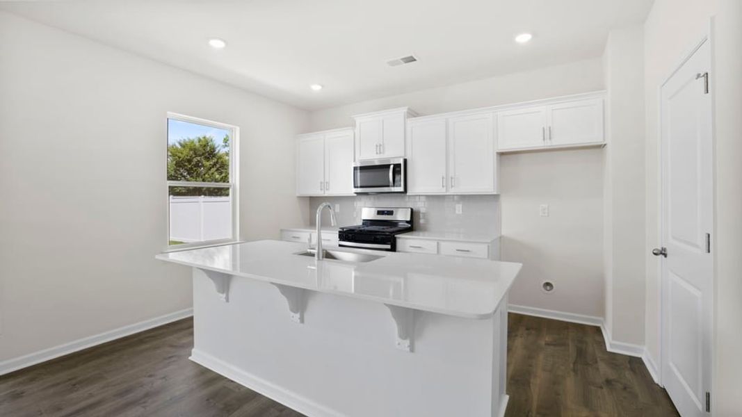 Furnished interior view inside a new home in Durbin Meadows Traditions, Fountain Inn (Image 9).