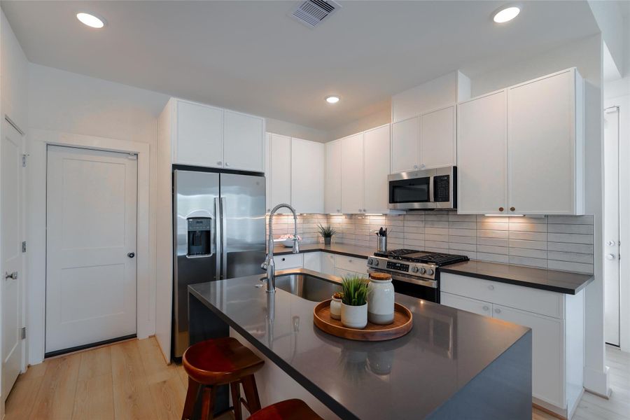 Furnished interior view inside a new home in Paul Quinn Court, Houston (Image 13).