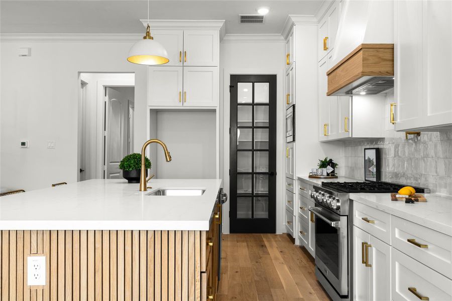 Stylish glass pantry door adds a modern and elegant touch to the space.