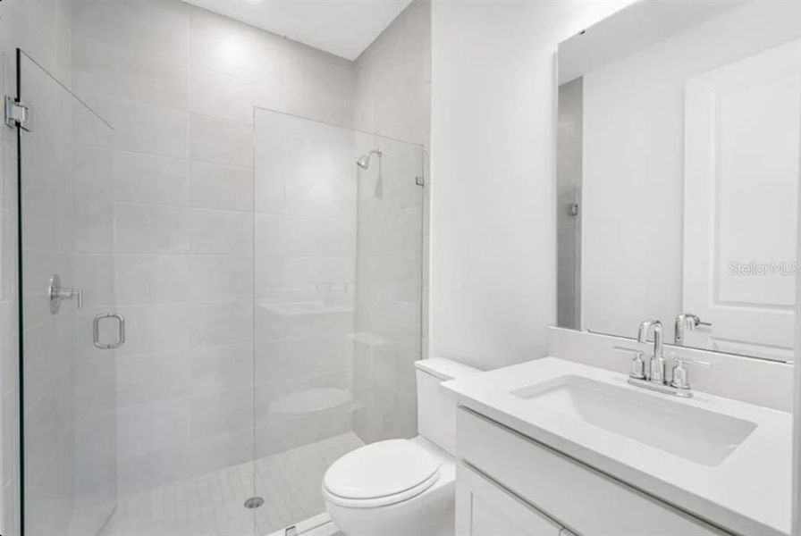 Furnished interior view inside a new home in Harvest at Ovation, Winter Garden (Image 12).