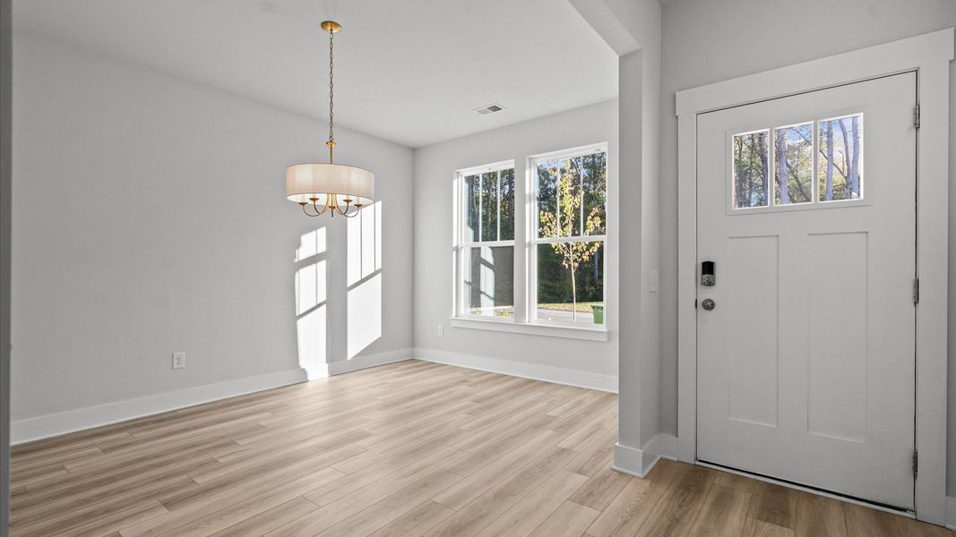 Furnished interior view inside a new home in Camden Cottages, Greenville (Image 5).