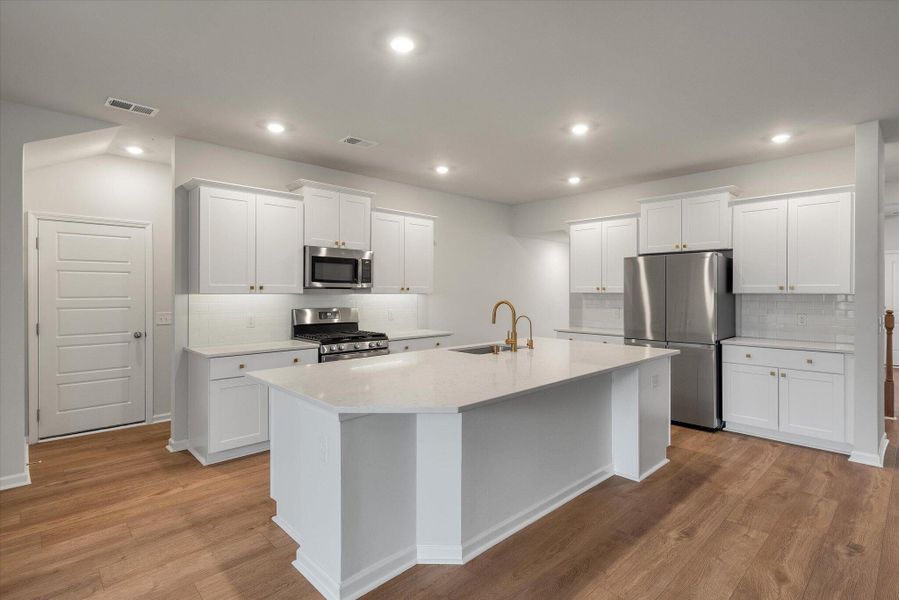 Furnished interior view inside a new home in Sweetgrass at Summers Corner, Summerville (Image 10).