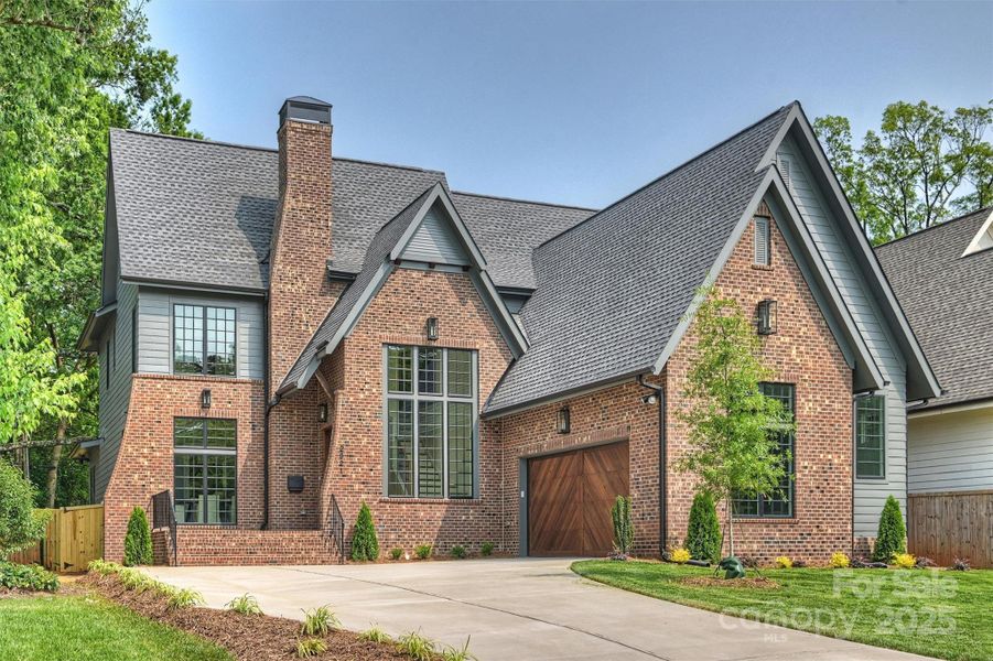 Front exterior of a new home in , Charlotte, NC, highlighting curb appeal (Image 1).