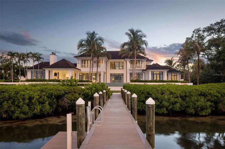 Front exterior of a new home in , Sarasota, FL, highlighting curb appeal (Image 27). Front exterior of a new home in , Sarasota, FL, highlighting curb appeal (Image 27).
