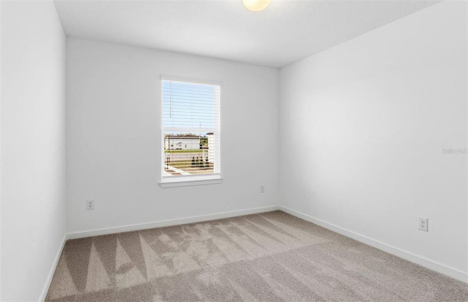 Spacious, unfurnished interior of a new home in Oakfield Lakes, Parrish (Image 18).
