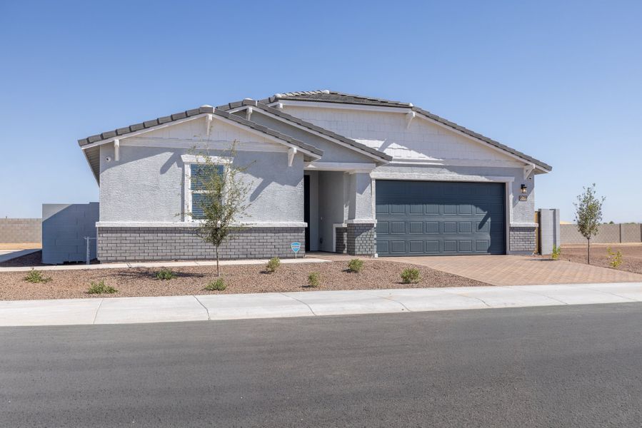 Front exterior of a new home in White Tank Foothills Signature Series, Waddell, AZ, highlighting curb appeal (Image 2). Front exterior of a new home in White Tank Foothills Signature Series, Waddell, AZ, highlighting curb appeal (Image 2).