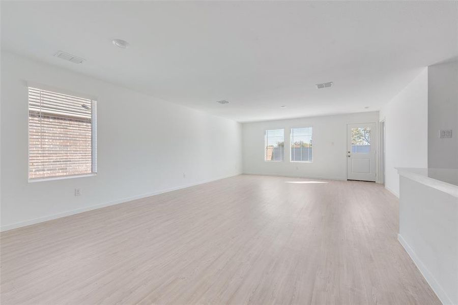 Spare room featuring light hardwood / wood-style flooring