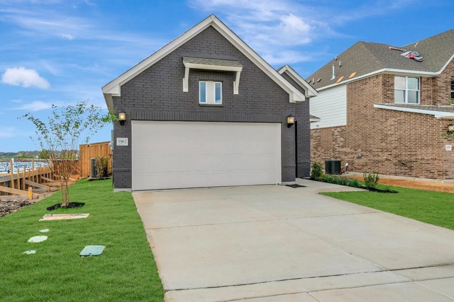Front exterior of a new home in Mayfair - Select Garden Series, New Braunfels, TX, highlighting curb appeal (Image 22).