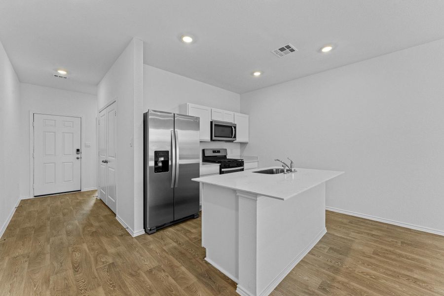 Furnished interior view inside a new home in Wayside, Uhland (Image 4).