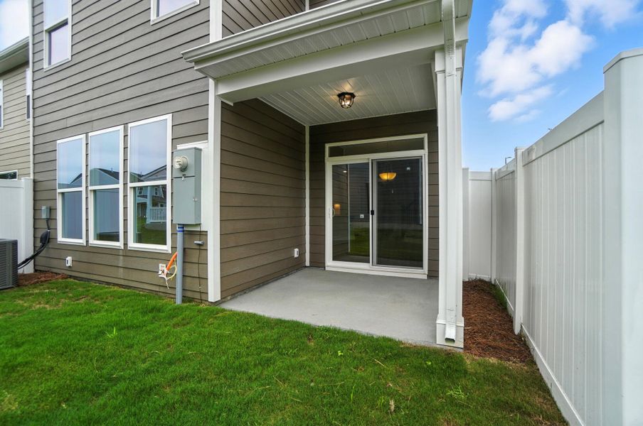 Front exterior of a new home in Harrisburg Village Townhomes, Harrisburg, NC, highlighting curb appeal (Image 31). Front exterior of a new home in Harrisburg Village Townhomes, Harrisburg, NC, highlighting curb appeal (Image 31).