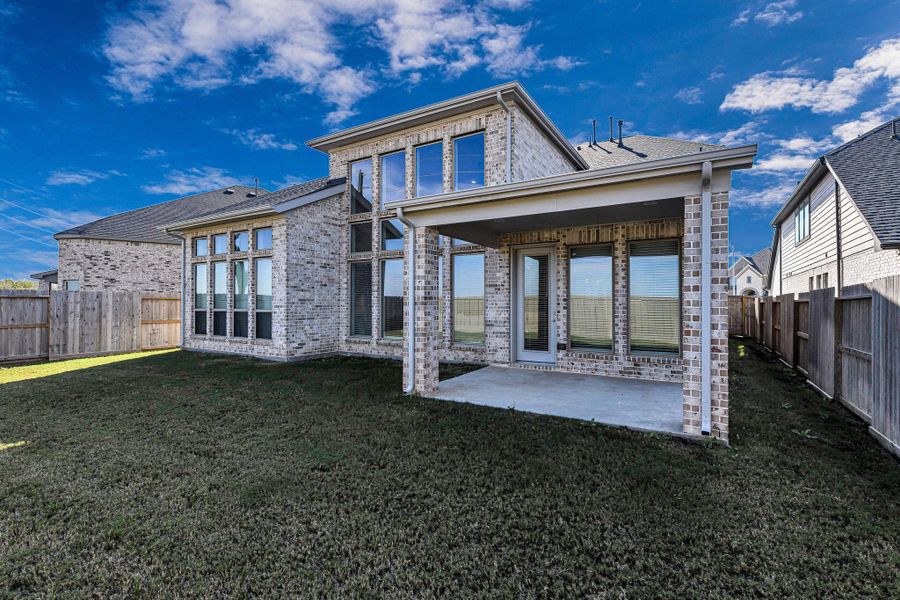 Exterior details and patio area of a home in Cross Creek West 55', Fulshear (Image 4). Exterior details and patio area of a home in Cross Creek West 55', Fulshear (Image 4).