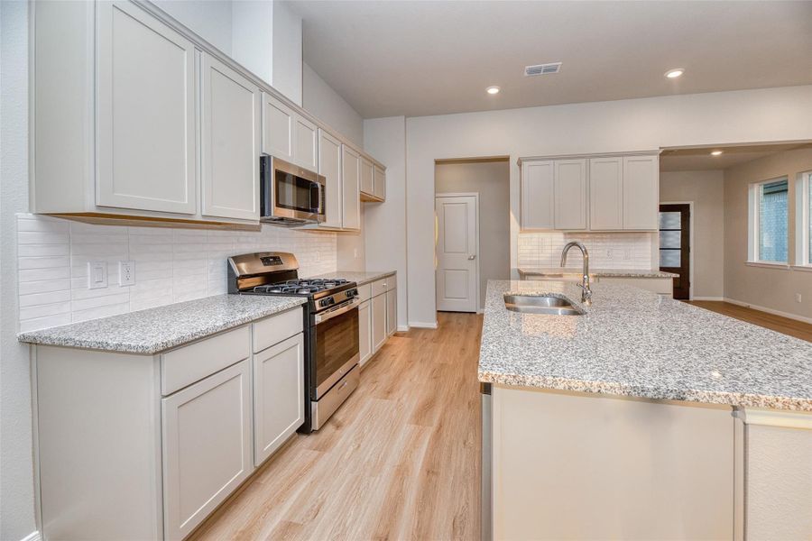 Furnished interior view inside a new home in Aldeana - Paintbrush Collection, Bonney (Image 11).