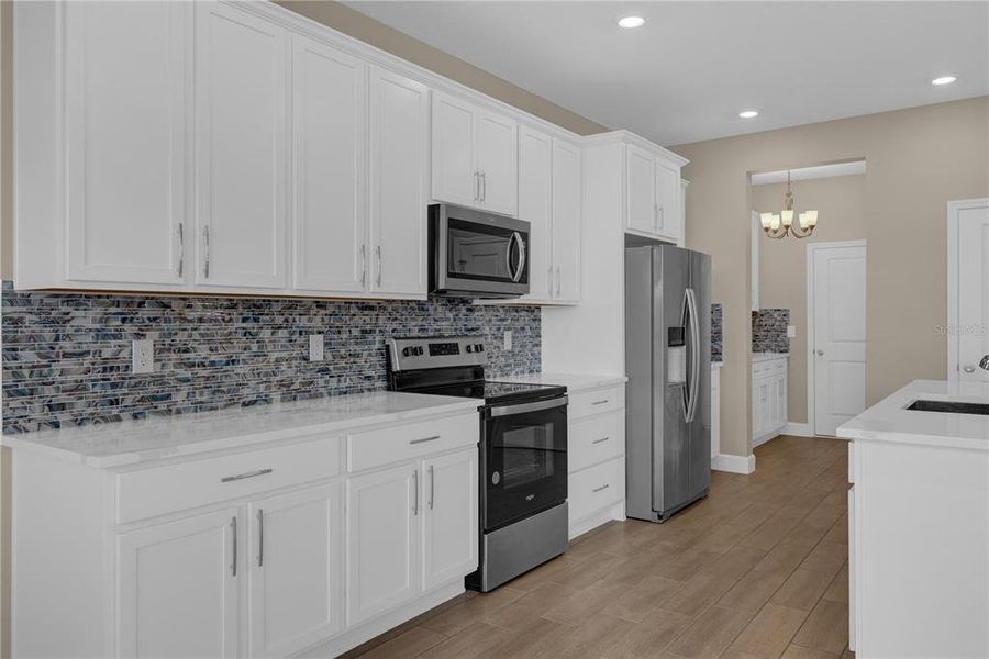 Furnished interior view inside a new home in , Minneola (Image 10). Furnished interior view inside a new home in , Minneola (Image 10).