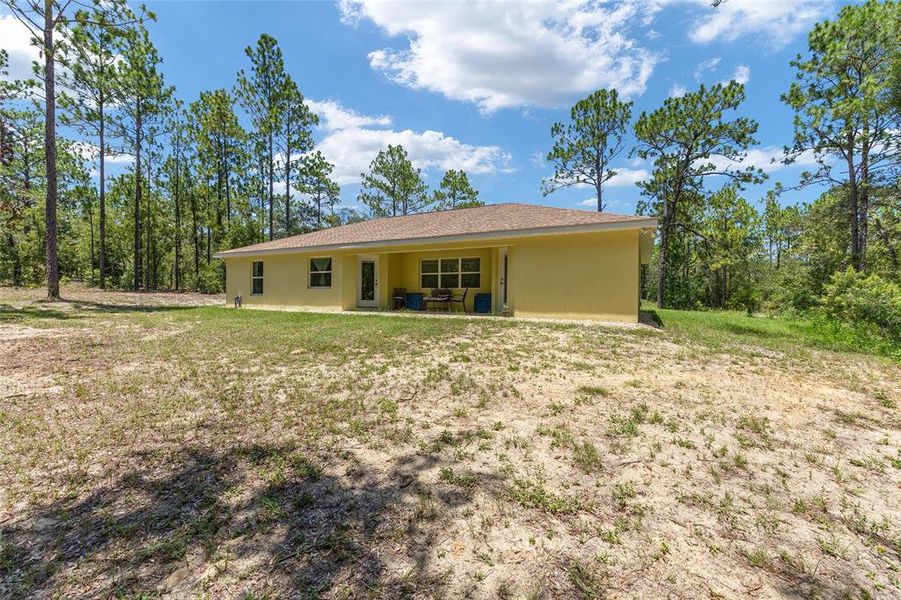 Front exterior of a new home in Rainbow Springs, Dunnellon, FL, highlighting curb appeal (Image 19).