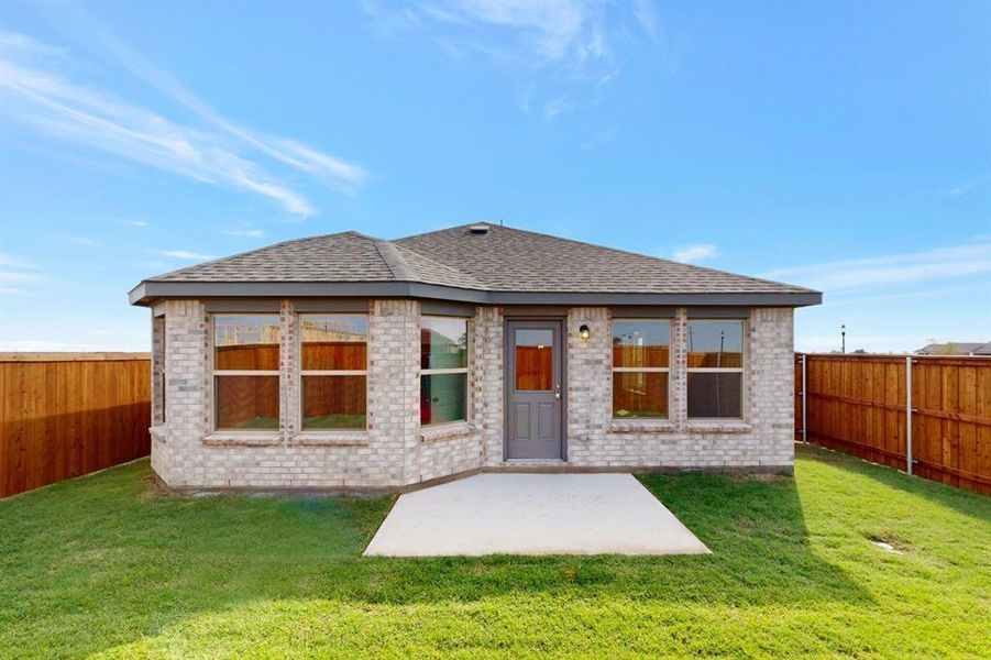 Exterior details and patio area of a home in Mobberly Farms, Pilot Point (Image 19). Exterior details and patio area of a home in Mobberly Farms, Pilot Point (Image 19).