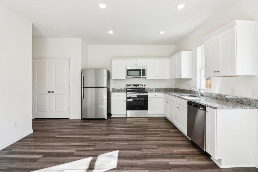 Furnished interior view inside a new home in Eagles Landing, Elgin (Image 5).