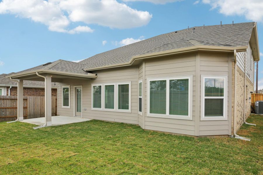 Exterior details and patio area of a home in Wall Street Village, Richmond (Image 23). Exterior details and patio area of a home in Wall Street Village, Richmond (Image 23).