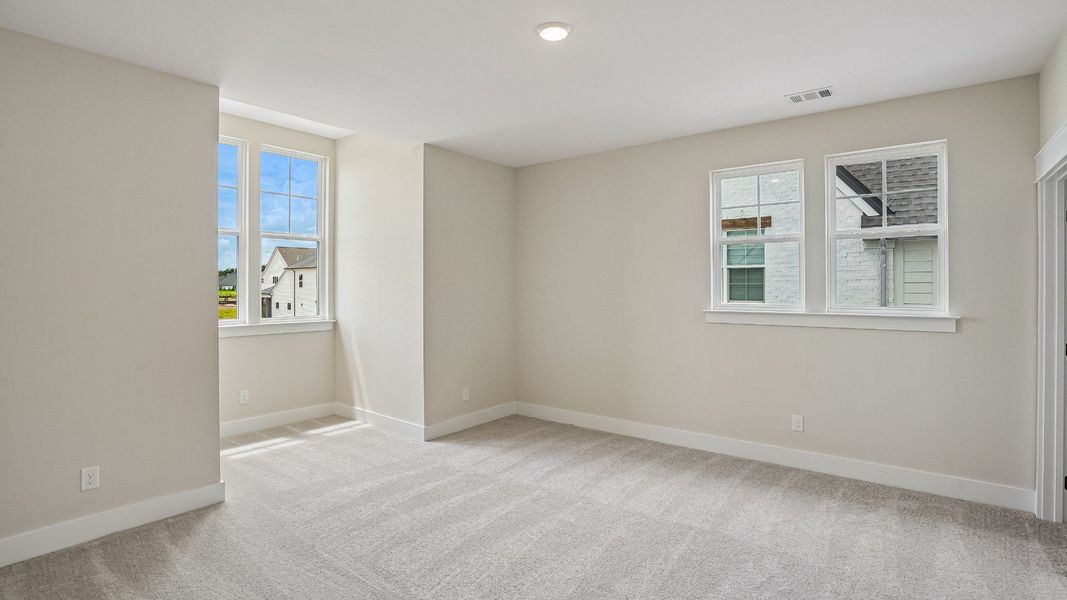 Guest Bedroom with windows and dormer