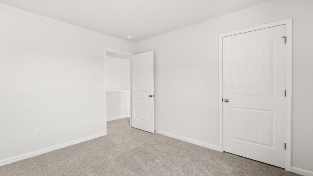 Spacious, unfurnished interior of a new home in Parkside at Carter Grove, Cartersville (Image 25).