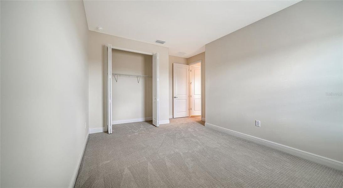 Spacious, unfurnished interior of a new home in Palm Grove, Lakewood Ranch (Image 40).