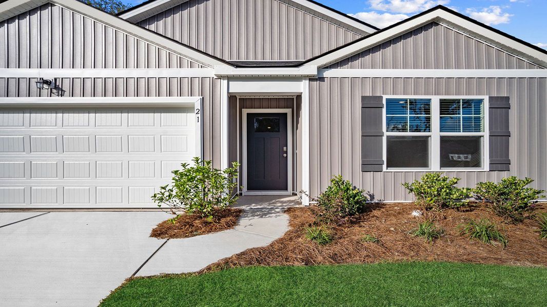 Exterior details and patio area of a home in The Groves at Bees Creek, Ridgeland (Image 2).