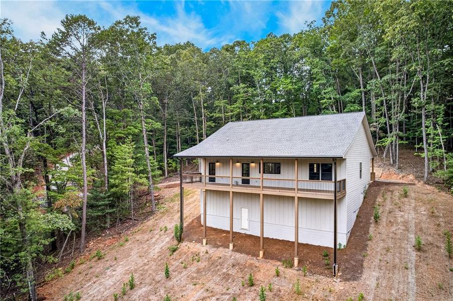Exterior details and patio area of a home in , Ellijay (Image 29).