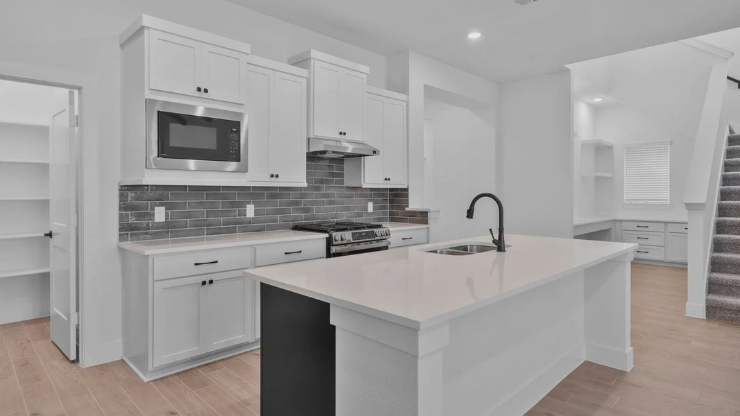 Furnished interior view inside a new home in Wildrye 45', Waller (Image 9).