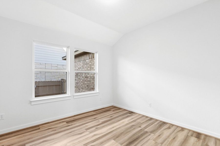 Spacious, unfurnished interior of a new home in The Colony, Bastrop (Image 17).