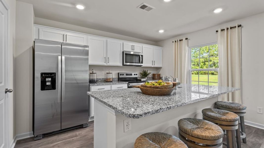 Representative furnished interior of a home built from the Belhaven by D.R. Horton in Foxtail, Yadkinville (Image 13).