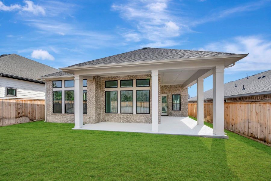 Exterior details and patio area of a home in Kresston - Enclave Collection, Magnolia (Image 3).