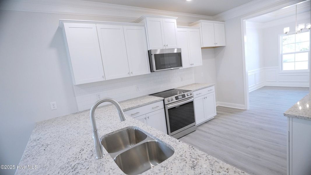Furnished interior view inside a new home in Palmetto Creek, Bolivia (Image 4).