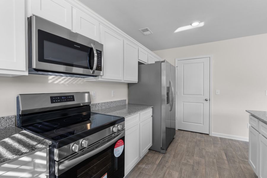 Furnished interior view inside a new home in Sibley Village, Sumter (Image 7).